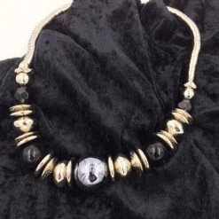 Suzie Blue Snake & Ball Necklace Clothing & Accessories