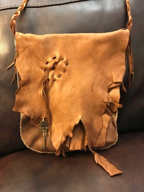 Kimberly Vaughn (Findlay, OH) Local Artist Of The Week: Kimberly Vaughn-Large Chocolate Deerskin Bag With "Bullet Hole" Patch 1 Kimberly Vaughn (Findlay, OH) Local Artist Of The Week: Kimberly Vaughn-Large Chocolate Deerskin Bag With "Bullet Hole" Patch